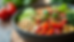 Close-up view of a colorful bowl of fresh vegetables and grains arranged for a mindful meal