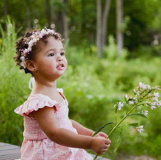 Aubrey in a flower field | Jacie Creatives