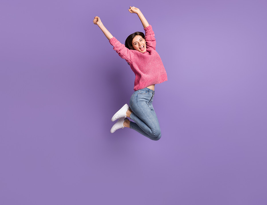 Full length body size photo of jumping high female student gesturing like winner overjoyed