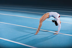 Gymnast Performing Bridge