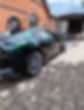 Car waiting to be loaded onto trailer