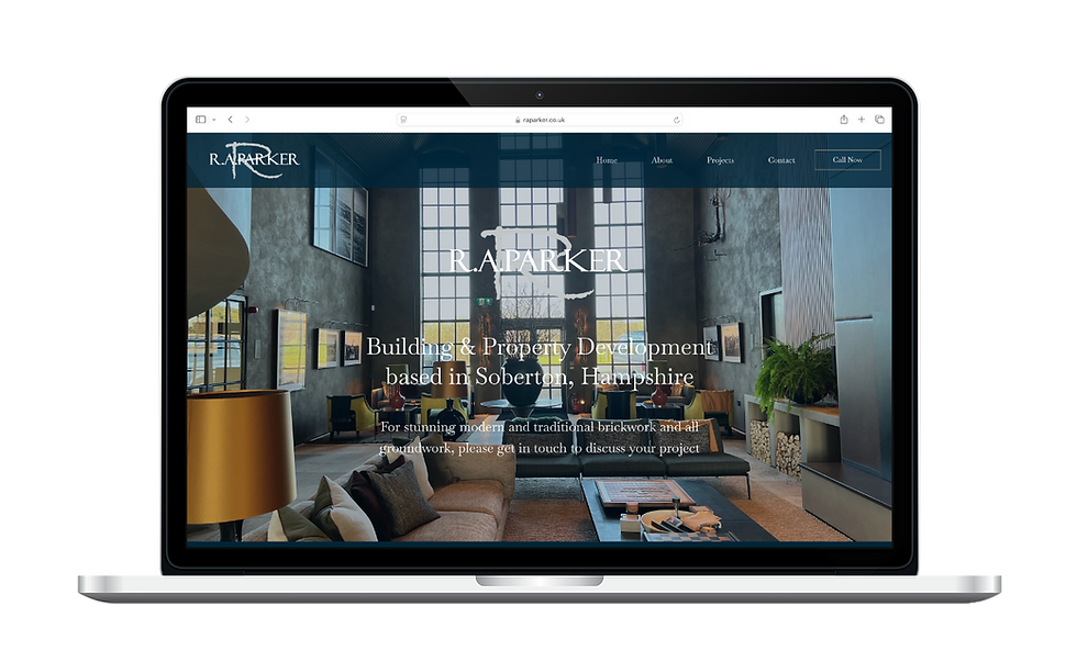 Laptop displaying a website for R.A. Parker, building and property development in Soberton, Hampshire. Modern lounge setting pictured.