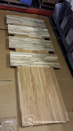 The wood we purchased from Southeastern Salvage. The short pieces are wood shelves we used around the house (laundry room, under stairs closet, downstairs guest room). The long pieces are the butcher block we purchased for the table and bar. Copyright 2015 Marla Baxter Sanderson - SockOnARooster.com
