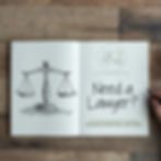 open book with writing in it asking if you need a lawyer from Hogan Stanton Lawyers