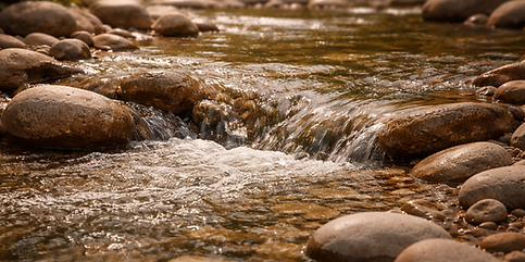 Water flowing down a river.