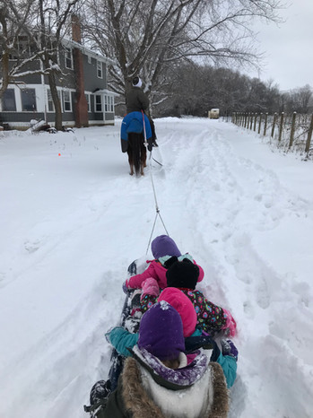 Storm and Andy Pulling the girls!