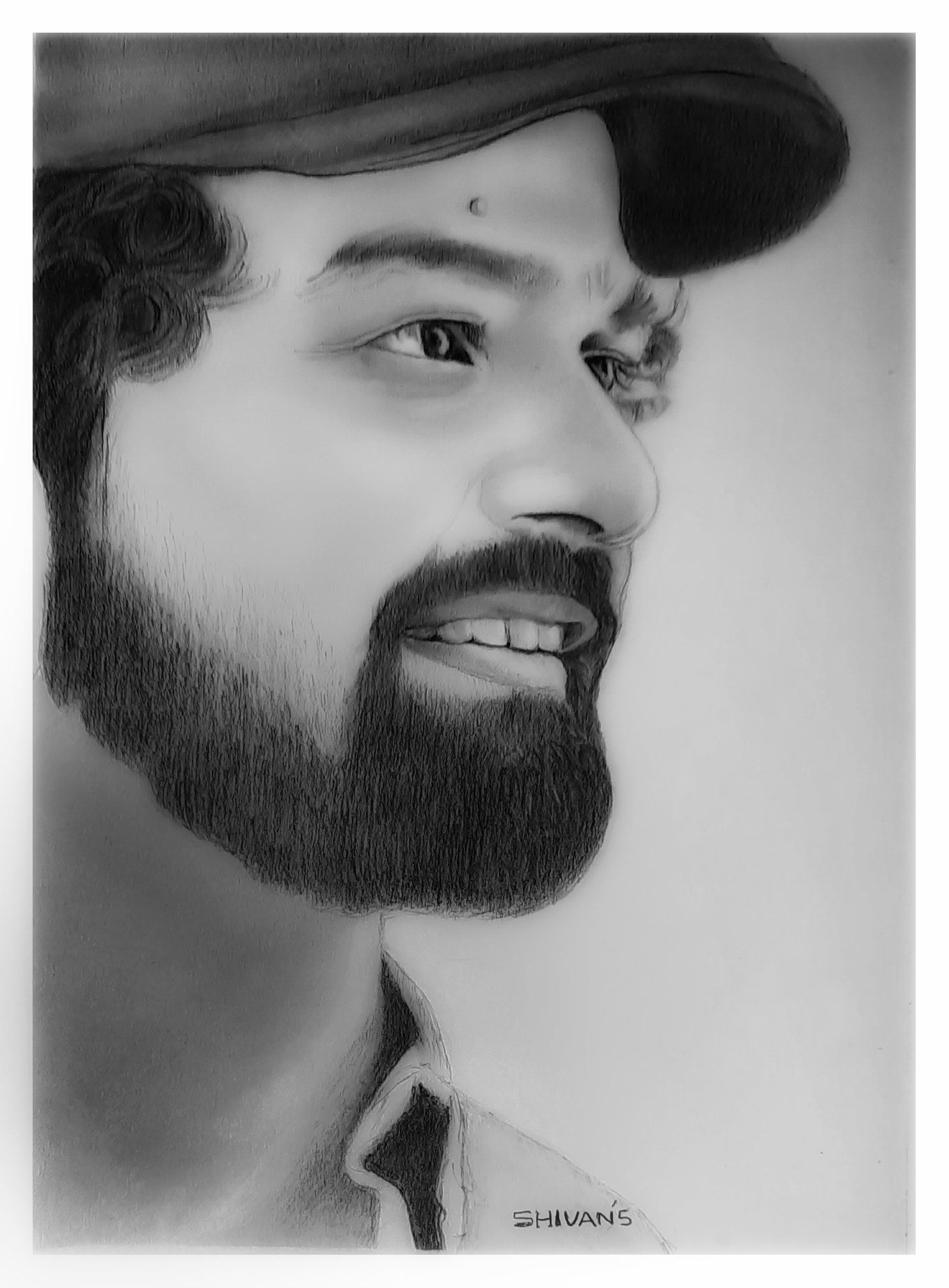 Handmade graphite pencil portrait of Malayalam film actor Pranav Mohanlal.