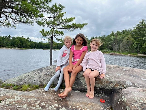 girls on flag pole rock.jpg