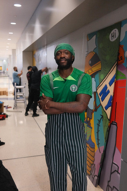 Renowned Brooklyn artist Ron Bass at JFK International Airport's Terminal 7