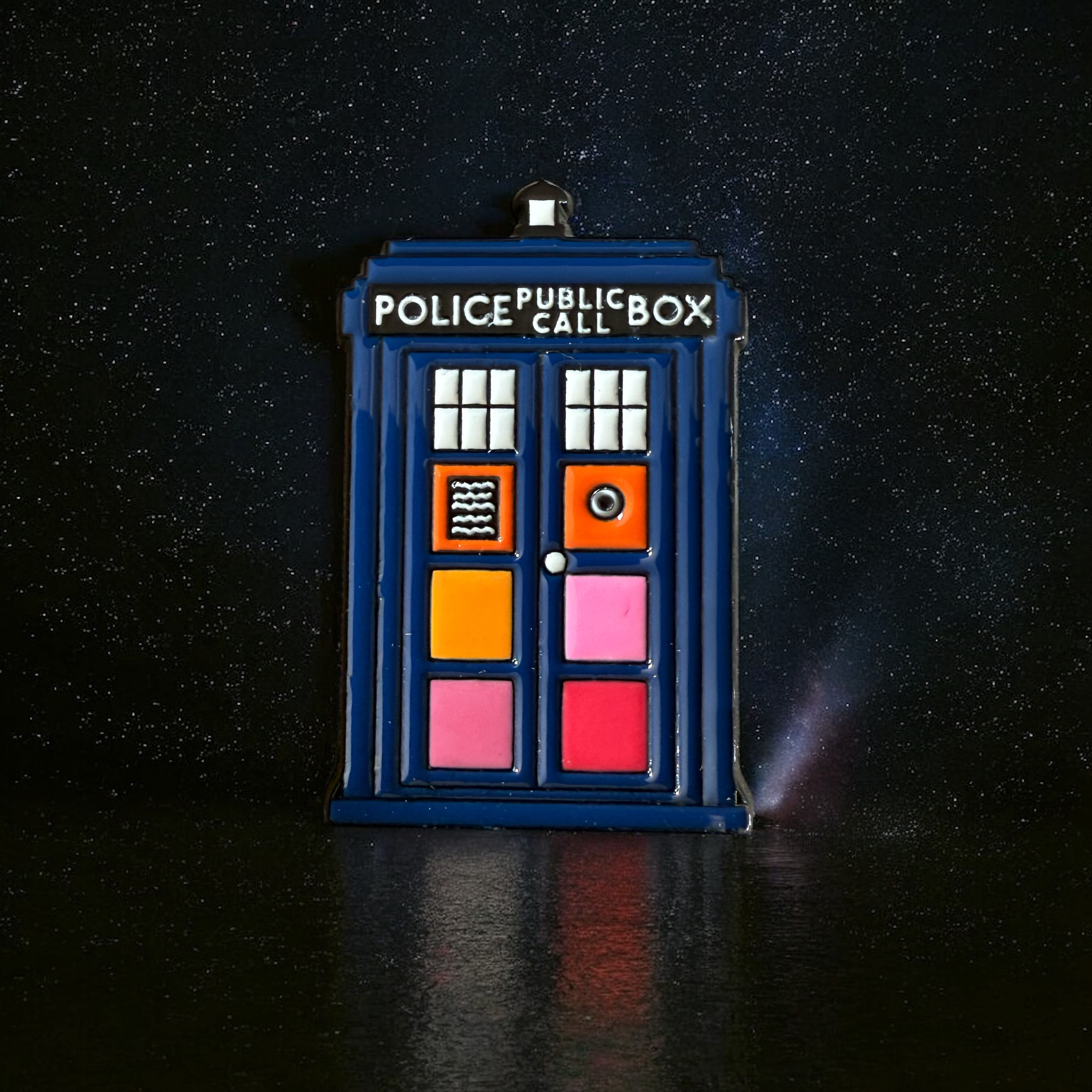 Lesbian inspired Police Box enamel pin badge.