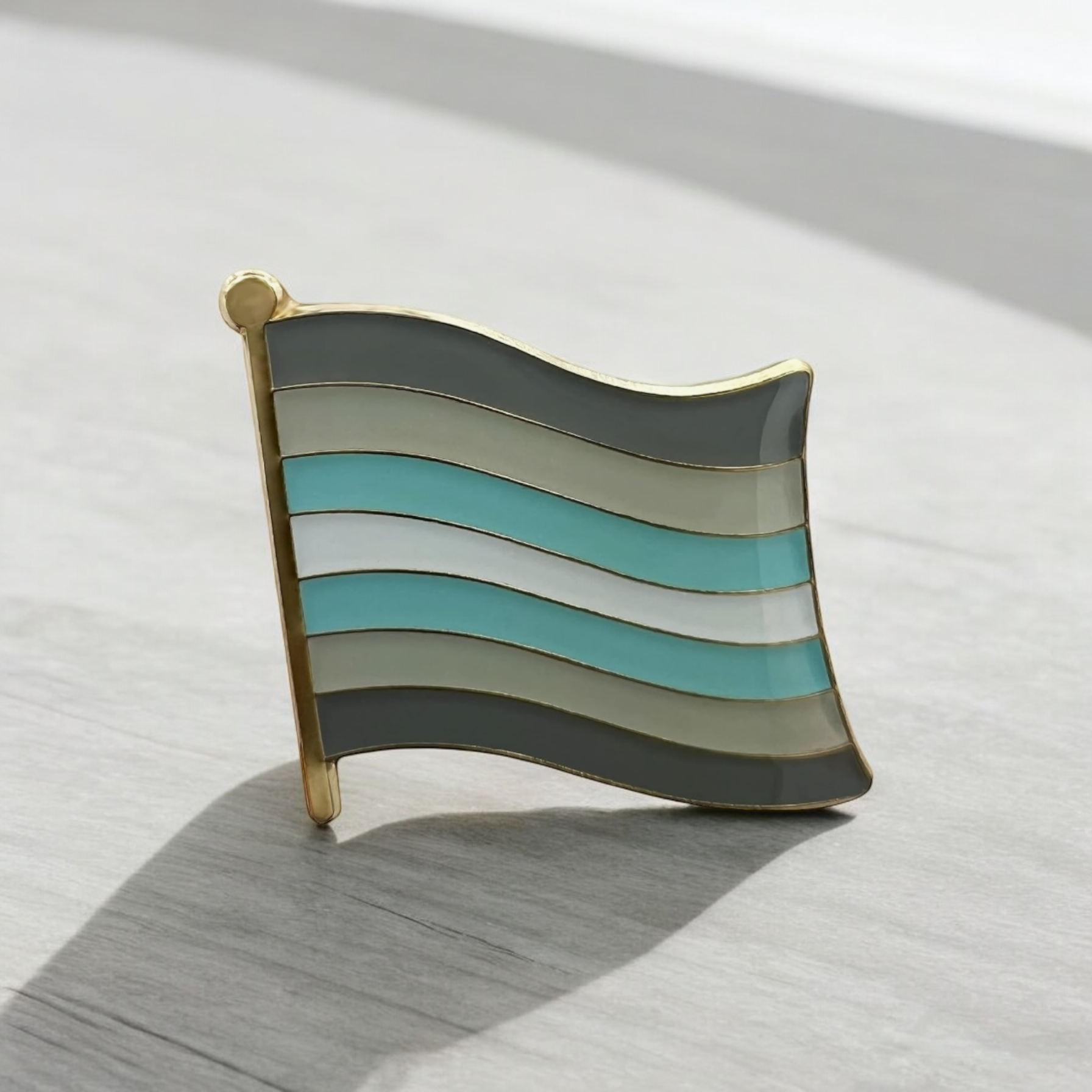 DemiBoy small flag enamel pin badge. 