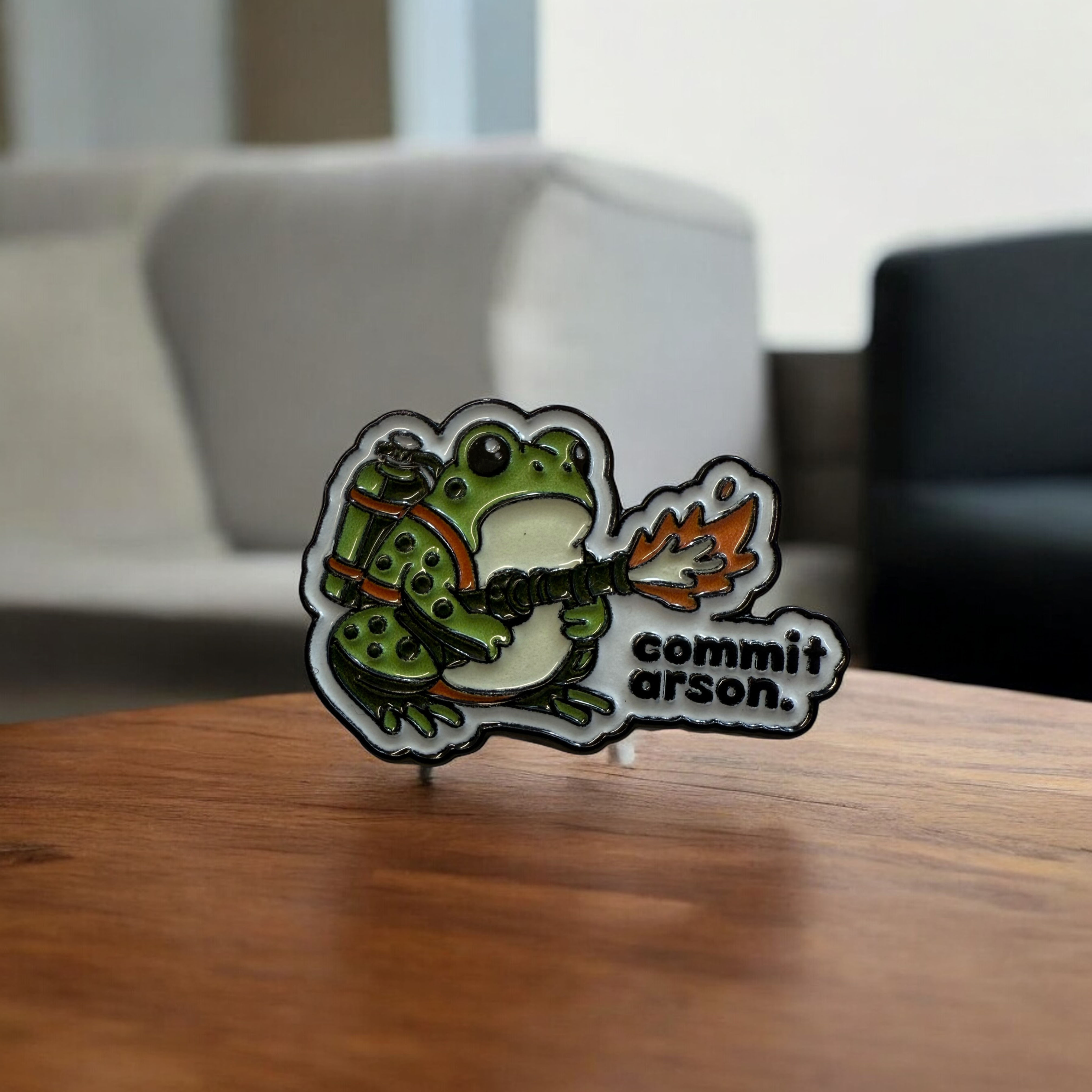 Commit Arson flame throwing frog funny enamel pin badge. 