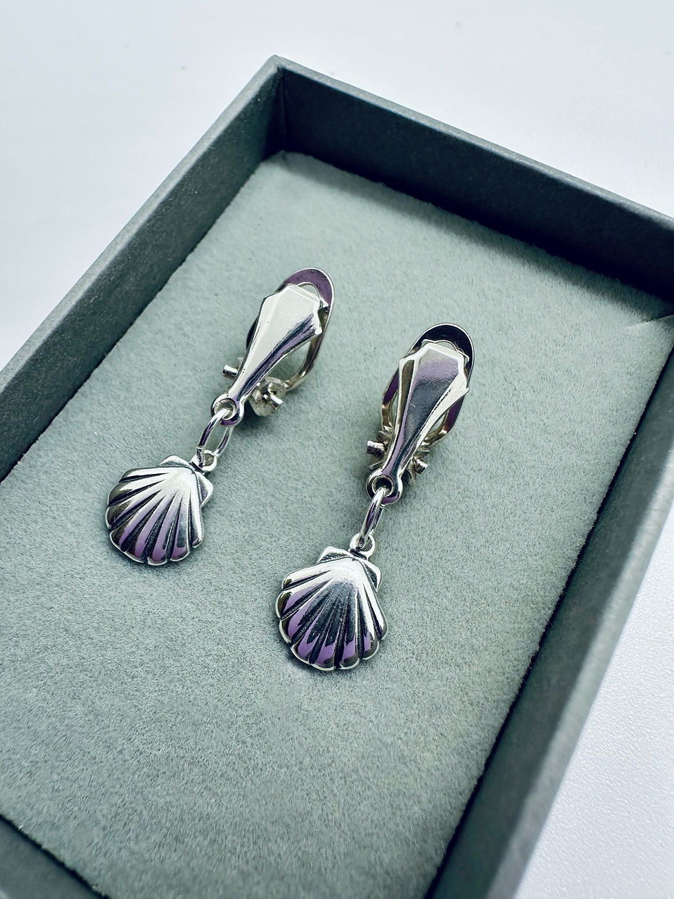 Thumbnail: Clip on silver drop earrings, sea shells, holiday or cruise ideal earrings