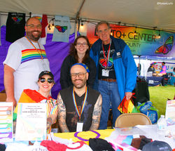 LGBTQ+ Center of Lake County Volunteers Smiling at PrideFest