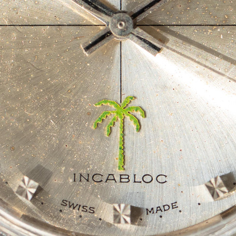 Palm tree logo on the vintage Pagol watch bearing incabloc