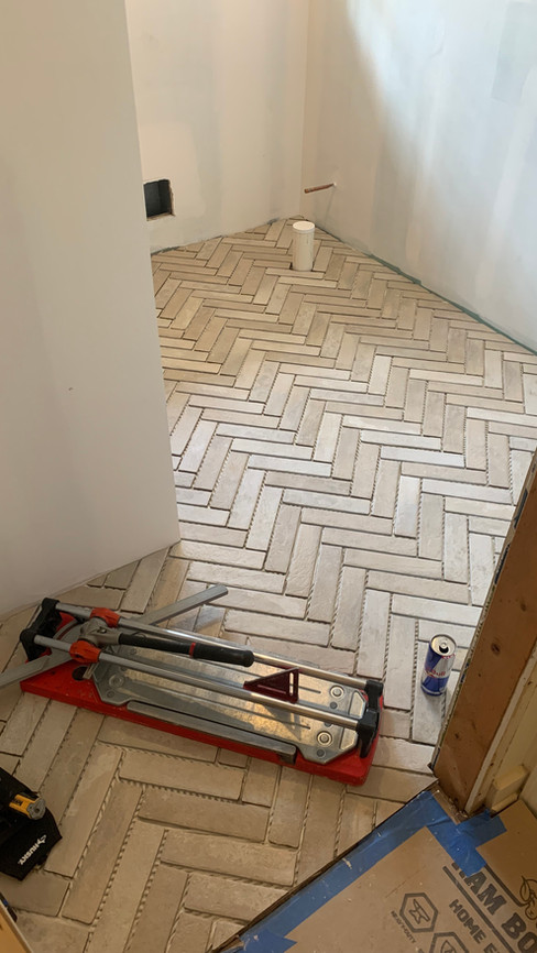 herringbone tile floor pre grout