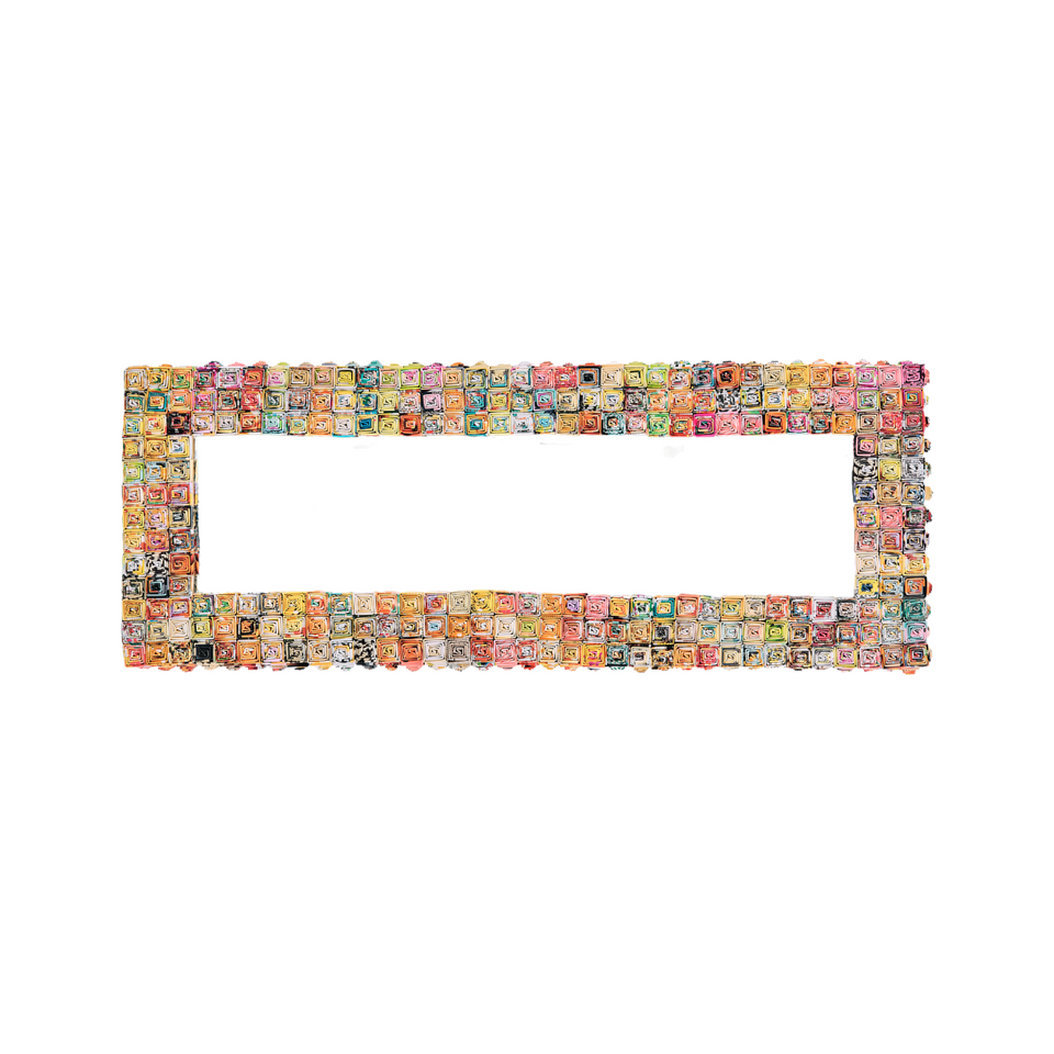 ‘Coral at Horseshoe Bay’
This piece is named after Horseshoe Bay in Bermuda where the long sweeping crescent of pink sands is dotted with rocky outcroppings and lapped by azure blue waters.
Materials: Crafted from repurposed magazines and mirror with wooden frame.
Measurements:145cm x 50cm
Weight: 9.5kg