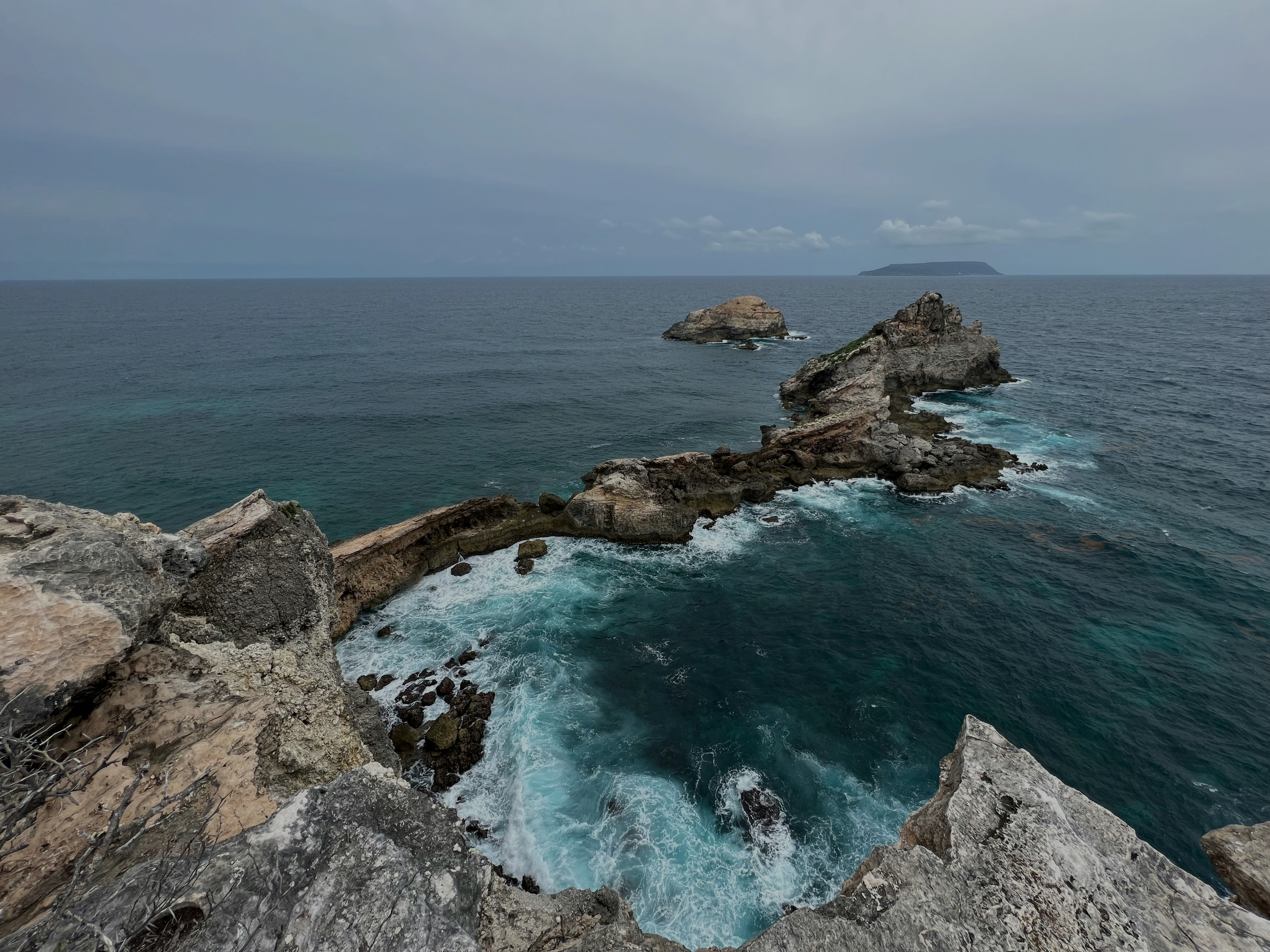 Rocky coastline in Guadeloupe with turquoise water