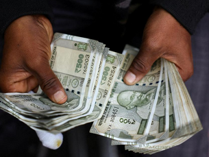 Indian rupee falls to all-time low of 96.47 against US dollar amid rising crude oil prices, global economic pressure, and weak risk sentiment in forex markets