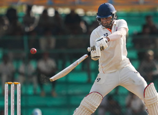 "Jammu & Kashmir cricket team celebrating key wickets against Karnataka in Ranji Trophy final