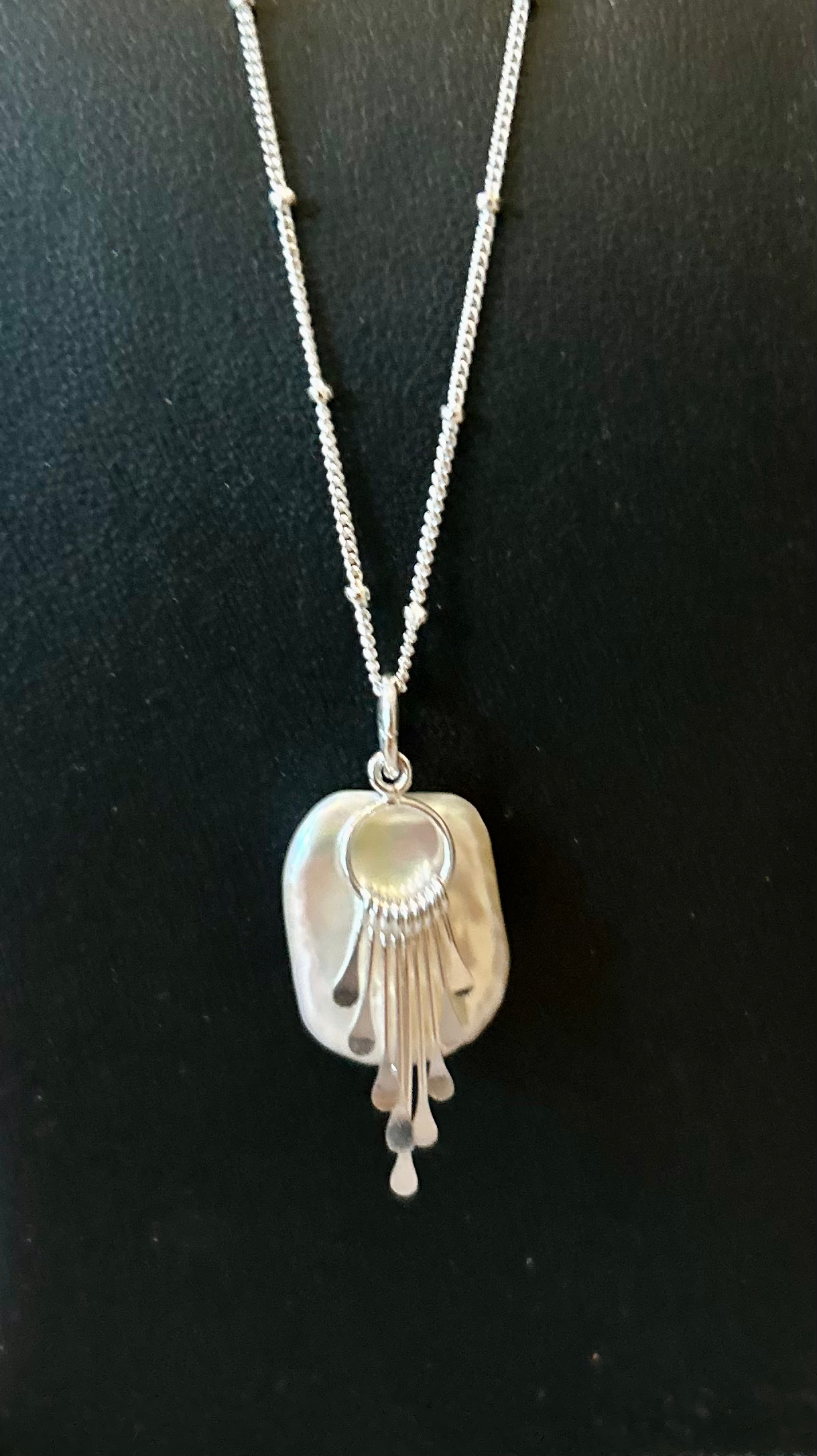 The Pearl and Tassel Pendant