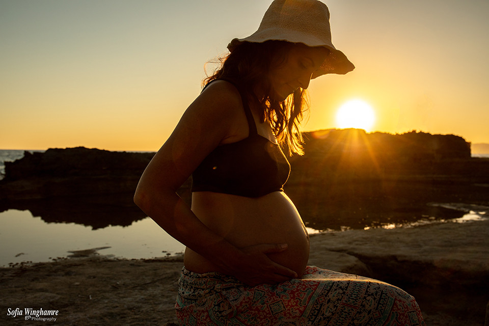 The majorcan sunset photographed with a pregnant girl