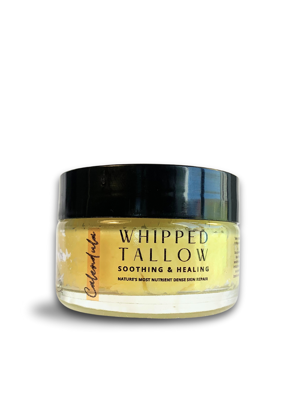 Single bottle of whipped tallow cream with calendula for soothing and hydrating skin.
