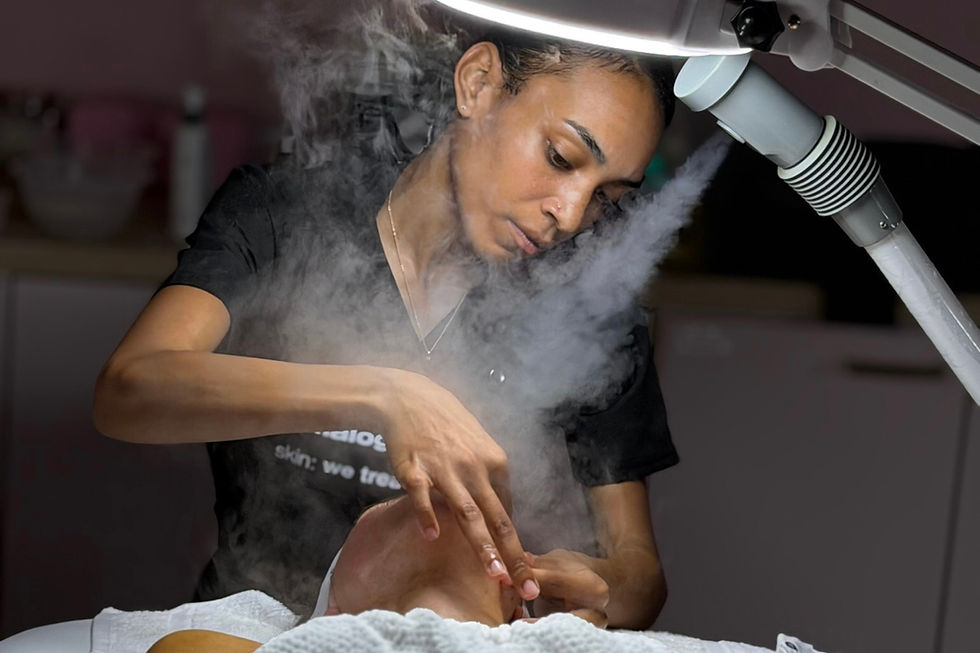Close-up view of esthetician tools and products arranged neatly on a training table