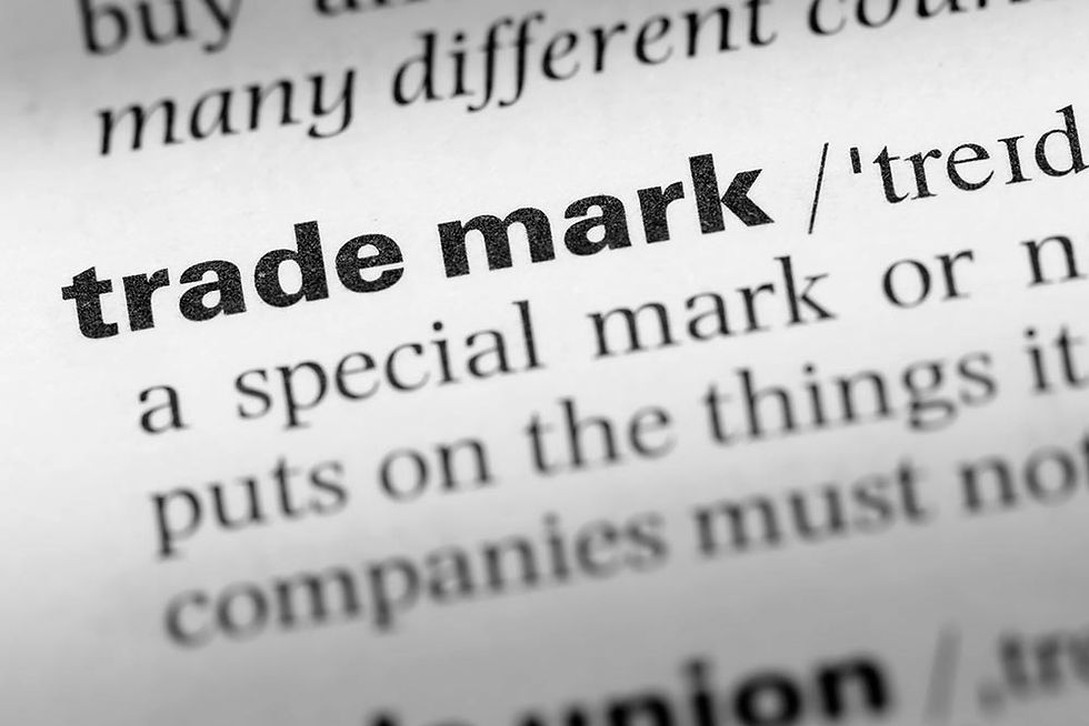 A photo of the dictionary entry "Trademark"