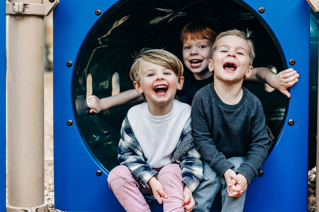 Three-Year-Olds playing outside on the school playground