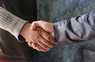 Holding hands with business partners to trust business partners, relationships to achieve