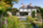 Wrap around extension and swimming pond