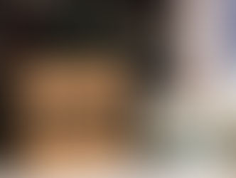 A sewing machine next to a WAWAK box with text "America's #1 Sewing Source for Over 100 Years." Colorful spools of thread in blurred background.