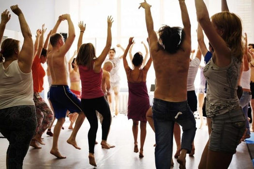 Group class jumping in Dynamic Meditation