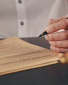 close-up-lawyer-businessman-working-reading-lawbook-office-workplace-consultant-lawyer-con