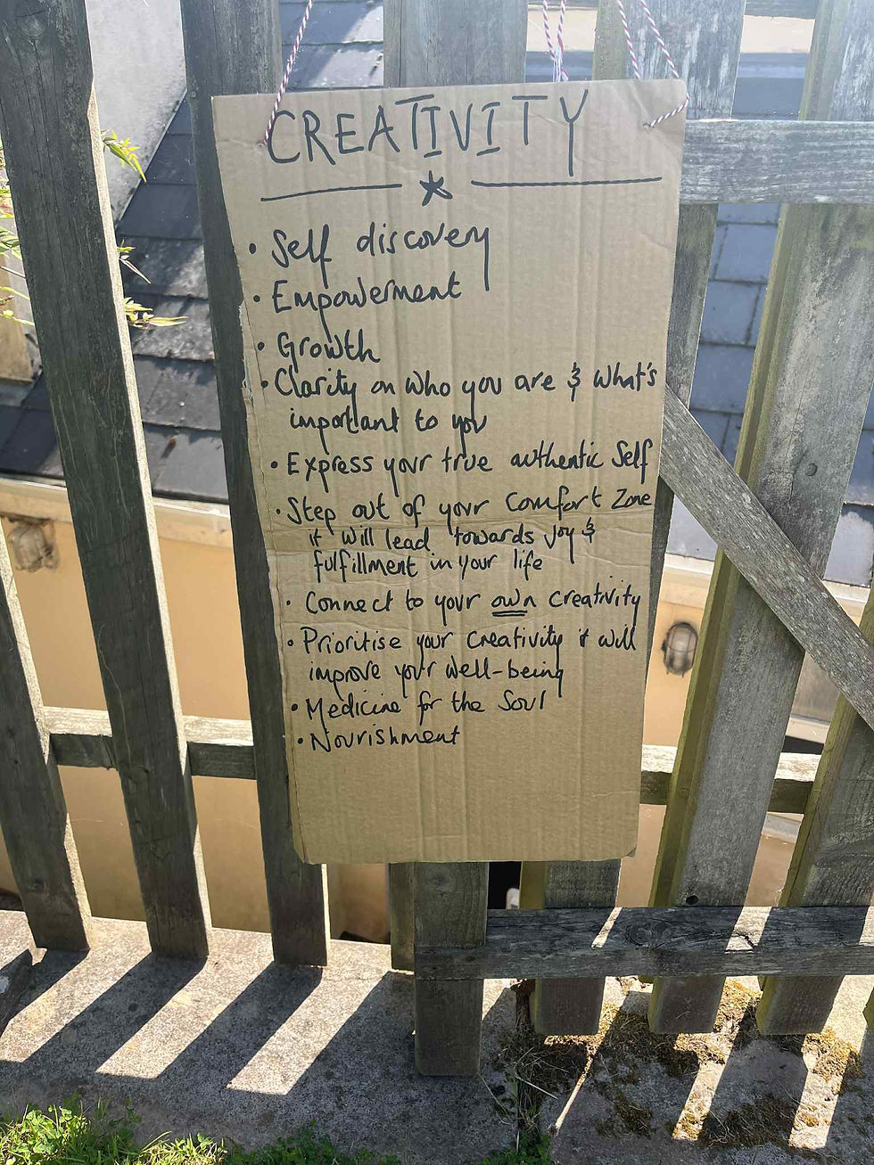 Creativity Takes Courage hand written sign listing the benefits of being creative.