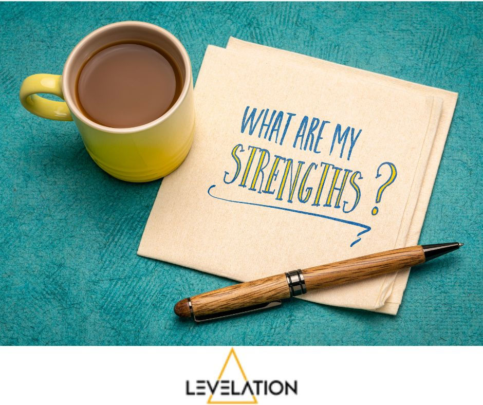 Some psychometric assessment tests focus on strengths written on paper her with a coffee mug and pen