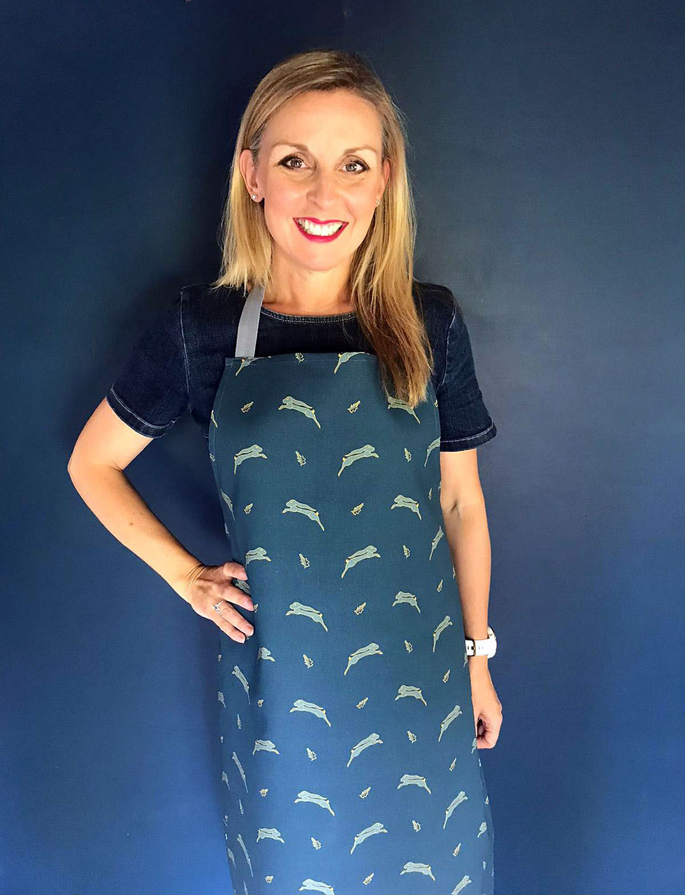 Whimsical Hare dark blue kitchen apron by Willis Bloom. Made in England.