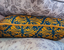 Willis Bloom Calla Lily fabric shown in a cushion, Midnight gold colourway. Beautiful home inspiration. 