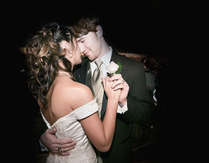 Post-Ceremony photo of the couple sharing a kiss