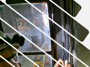  Case study graphic for "Steeled for Safety," showing a HoistCam logo and a crane lifting a large coil of steel.