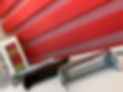 Close-up of red Capri colour chart and blinds