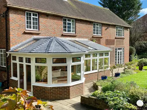 conservatory with SupaLite roof in large garden
