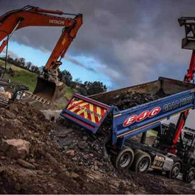 EJC Contracts tipper emptying out topsoil