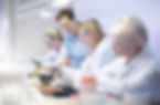 Dentist teaching students in lab.jpg
