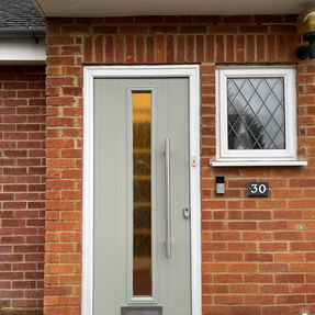 Grey door, front of a house