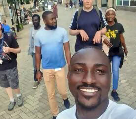 group shot of staff and young people on a day out