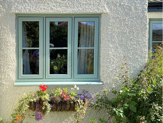 flush casement windows in a cottage