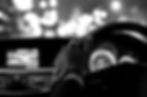 hands on wheel and city nightlife