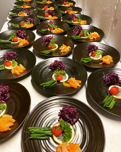 Table with plates of Japanese food